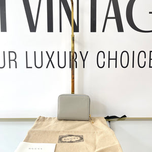 Portafoglio con logo Gucci grigio chiaro