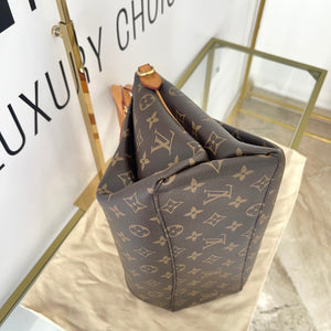 Borsa Rivoli PM Monogram Louis Vuitton