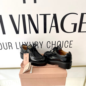 Scarpe stringate in pelle Miu Miu