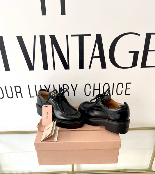 Scarpe stringate in pelle Miu Miu