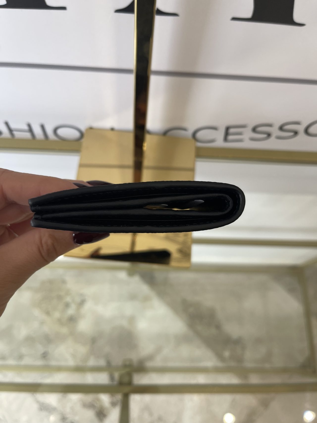 Portafoglio GG Supreme nero Gucci