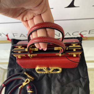 Borsa Rockstud Alcove Valentino Garavani in pelle granata