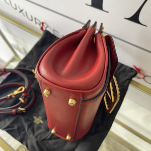 Borsa Rockstud Alcove Valentino Garavani in pelle granata