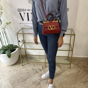 Borsa Rockstud Alcove Valentino Garavani in pelle granata